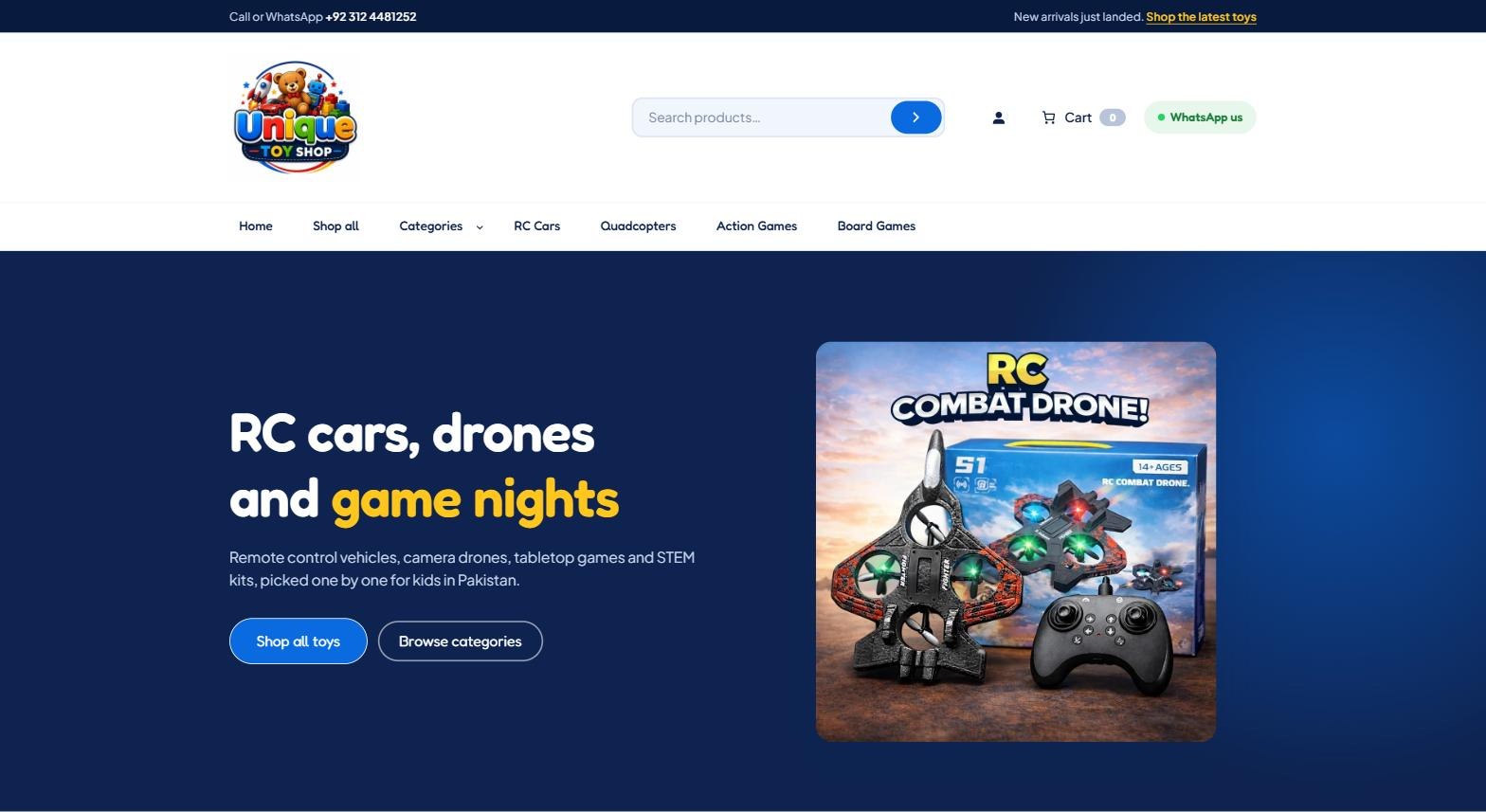 The Unique Toy Shop homepage, showing the shop logo, a product search bar, category navigation and a banner reading RC cars, drones and game nights beside a boxed remote control combat drone